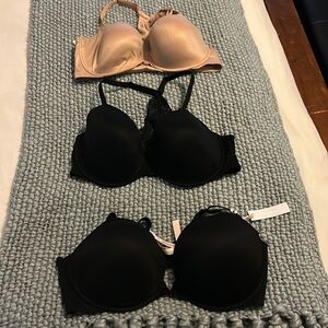 Three Victoria's Secret bras